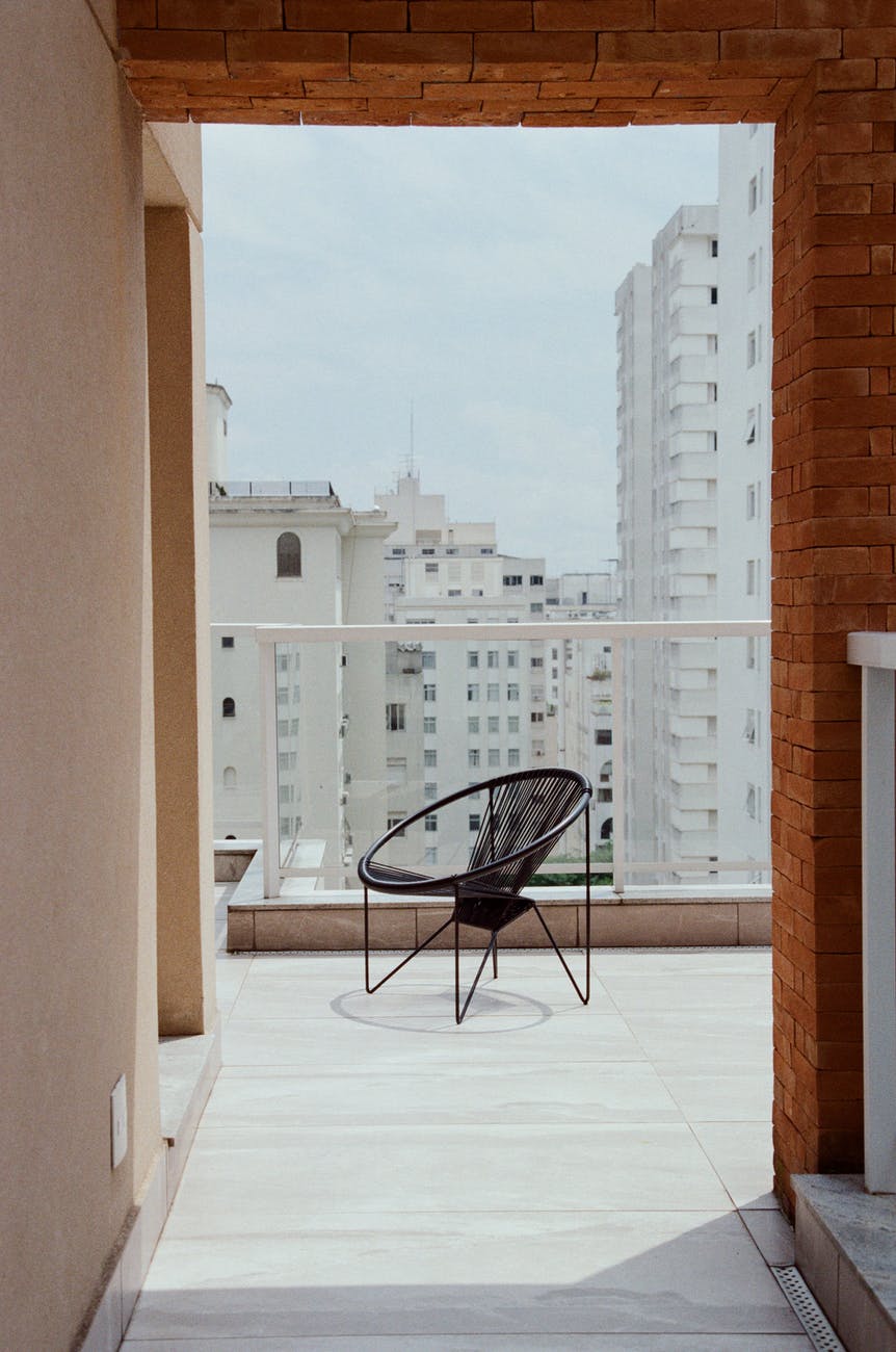 modern chair on balcony of modern building